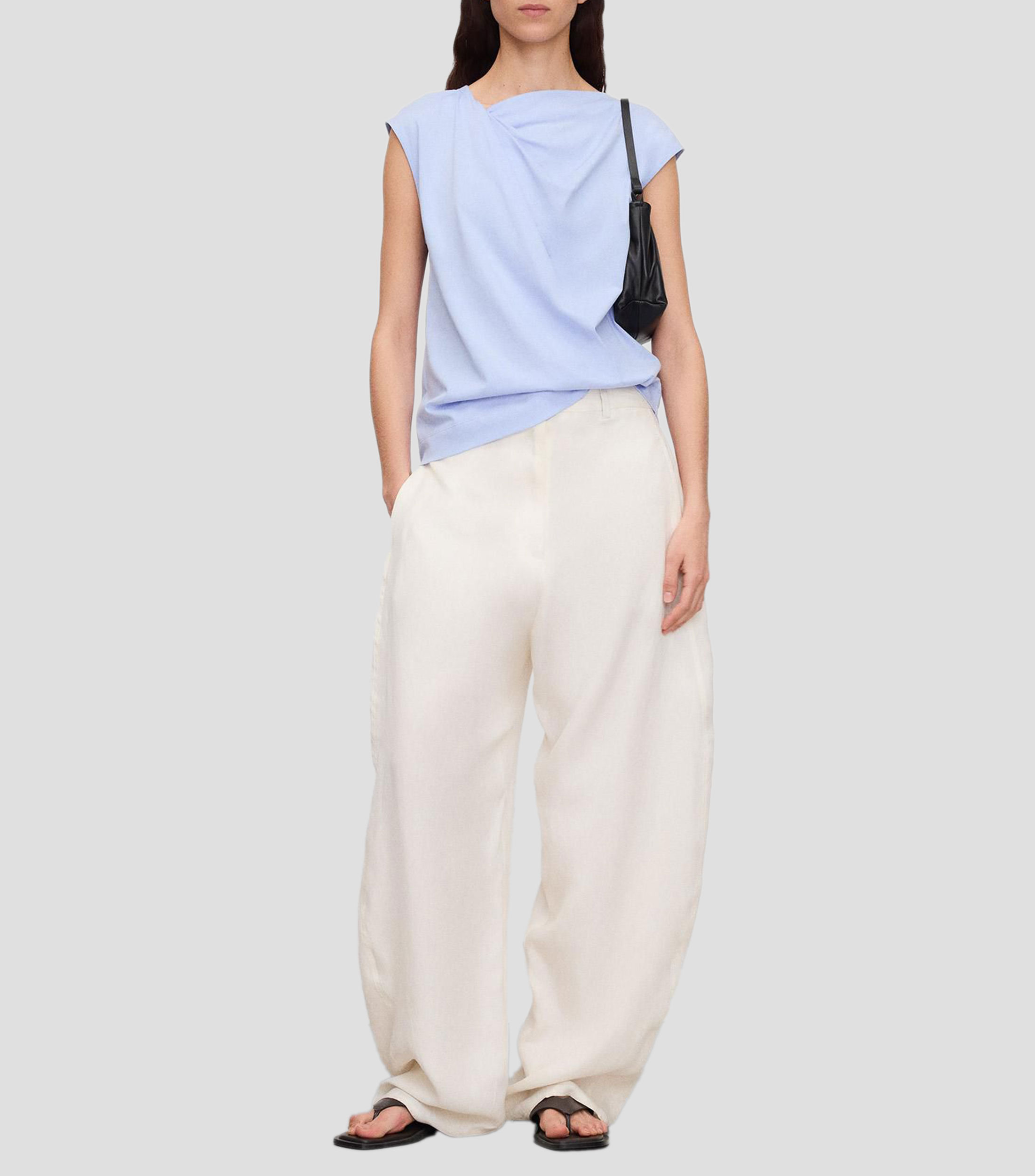 Blusa lisa sin mangas Mujer